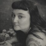 Black and White photo of Em Fullenwider taken by photographer Elysia Perkins